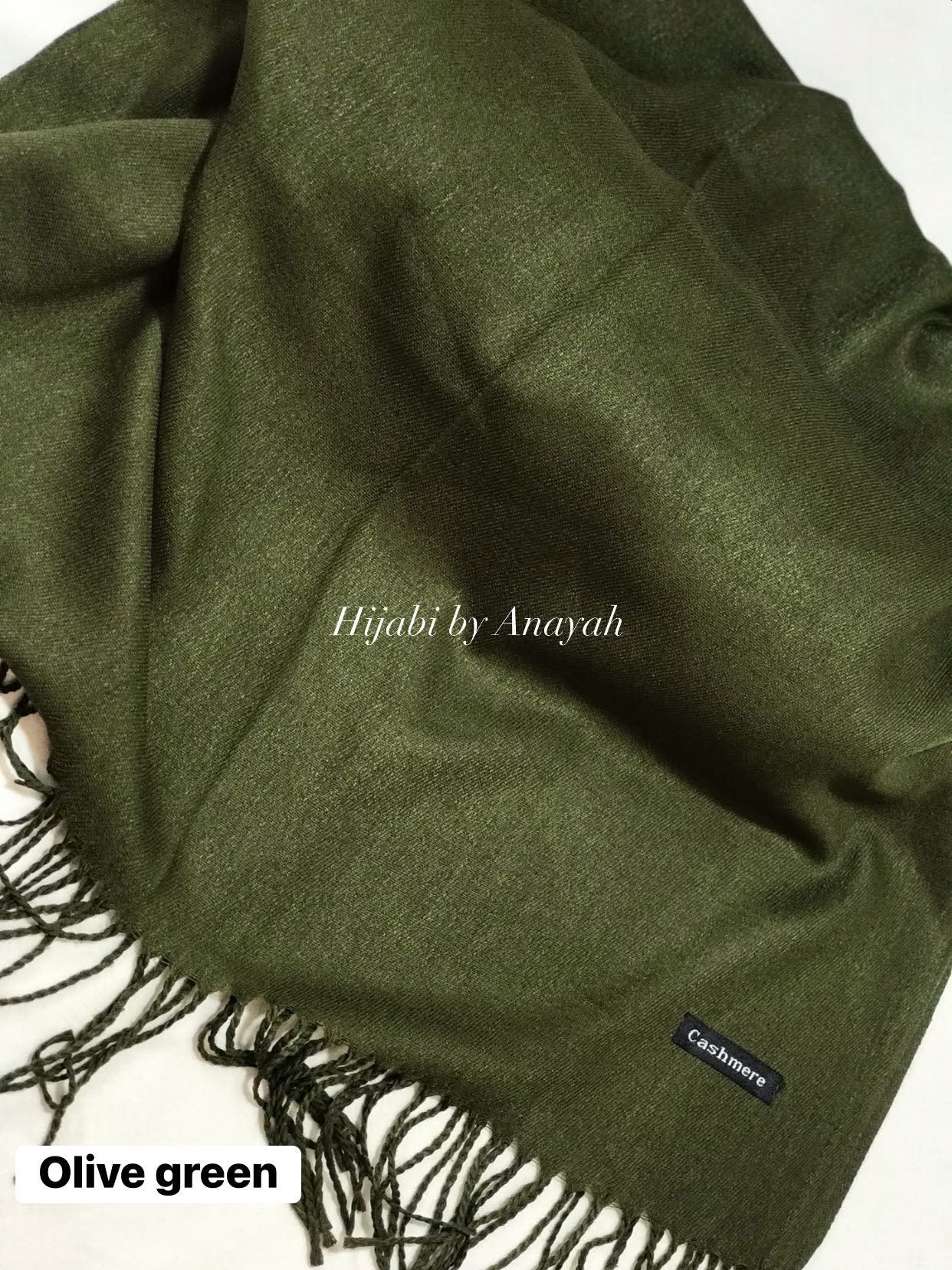 Olive green hijab with Cashmere label on a white background